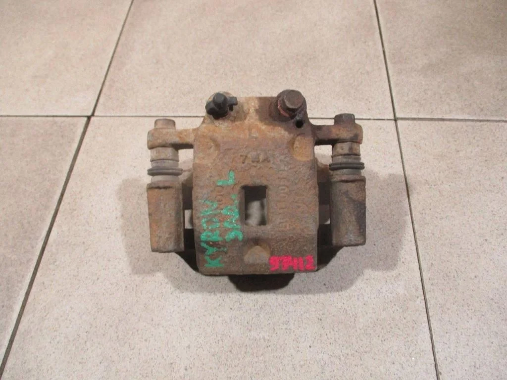 Суппорт задний левый SsangYong Kyron 2008 DJ