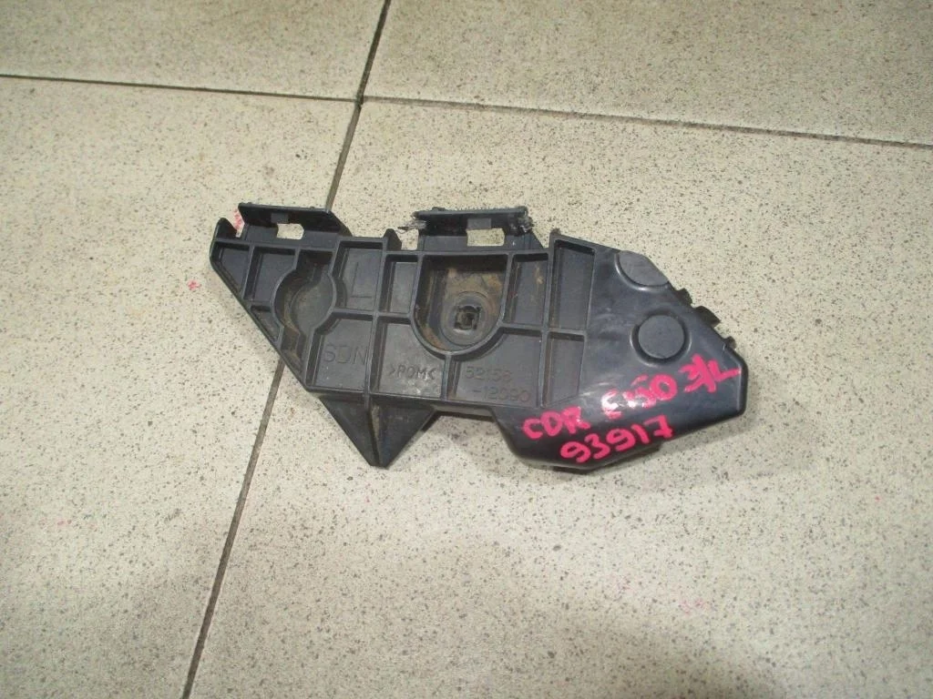 Кронштейн заднего бампера левый Toyota Corolla E150