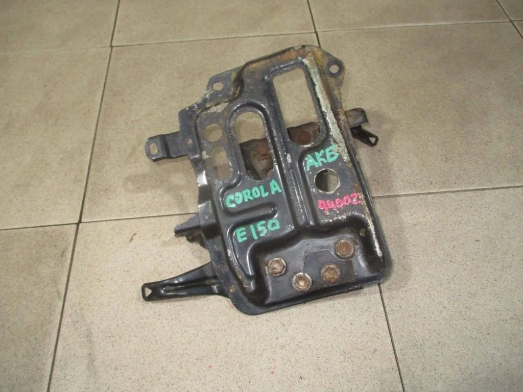 Крепление акб Toyota Corolla E150