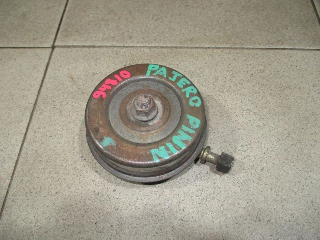 Ролик-натяжитель ремня грм Mitsubishi Pajero Pinin