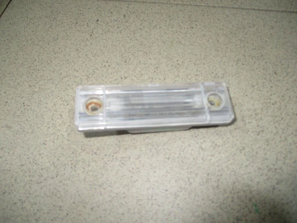 Фонарь подсветки номера Chevrolet Aveo T250, T255