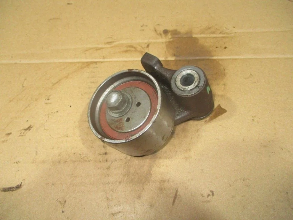 Ролик-натяжитель ремня грм Mitsubishi Pajero 4 2008 V80, V90