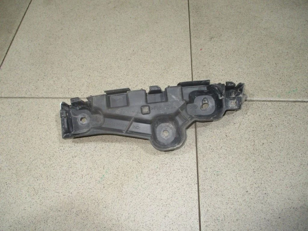 Кронштейн переднего бампера левый Renault Logan 2 L52