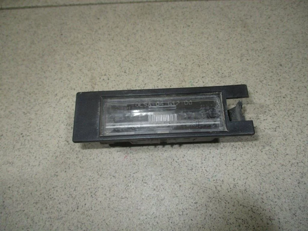 Фонарь подсветки номера Opel Corsa 2008 D