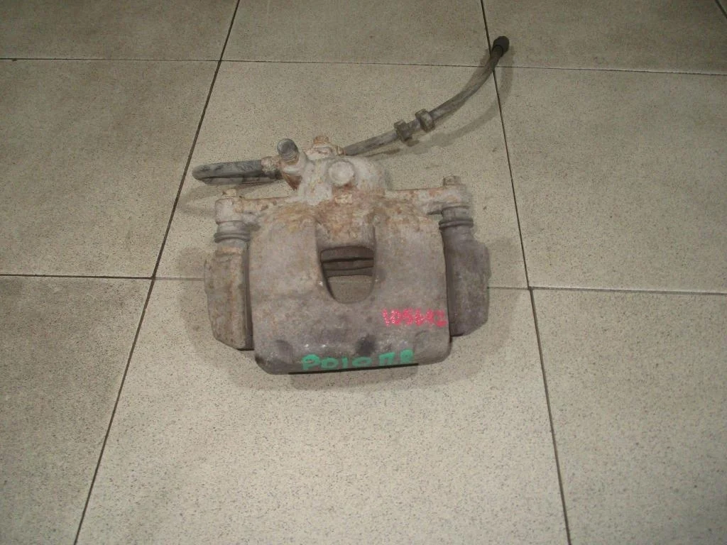 Суппорт передний правый Volkswagen Polo 5