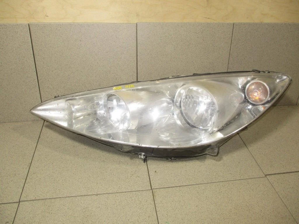 Стекло фары левой Peugeot 308 2010 T7