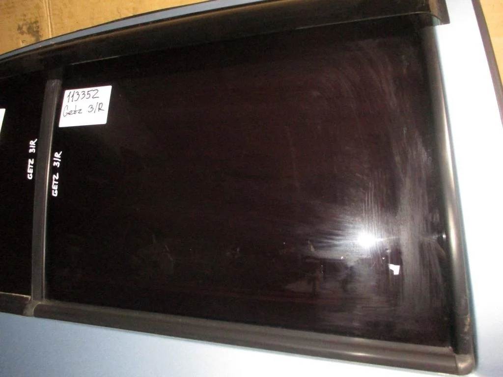 Стекло двери задней правой Hyundai Getz TB