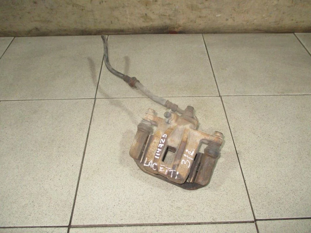 Суппорт задний левый Chevrolet Lacetti J200