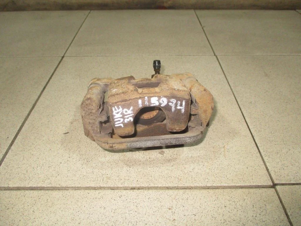 Суппорт задний правый Nissan Juke F15