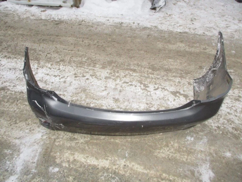 Бампер задний Toyota Corolla E150