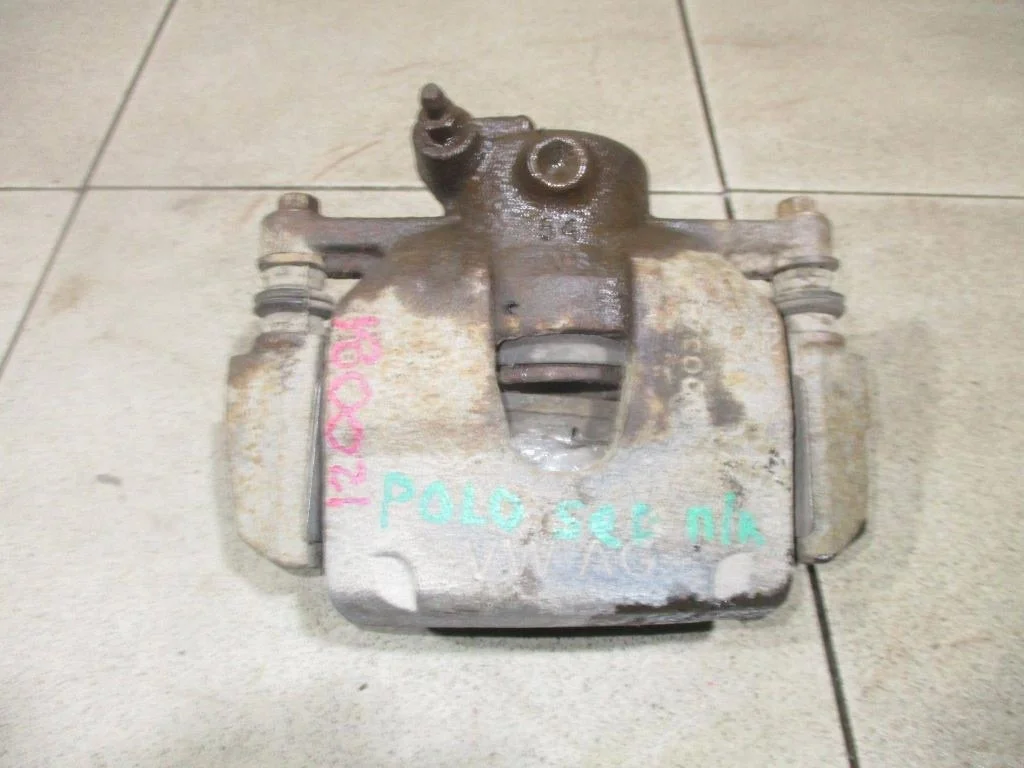 Суппорт передний правый Volkswagen Polo 5
