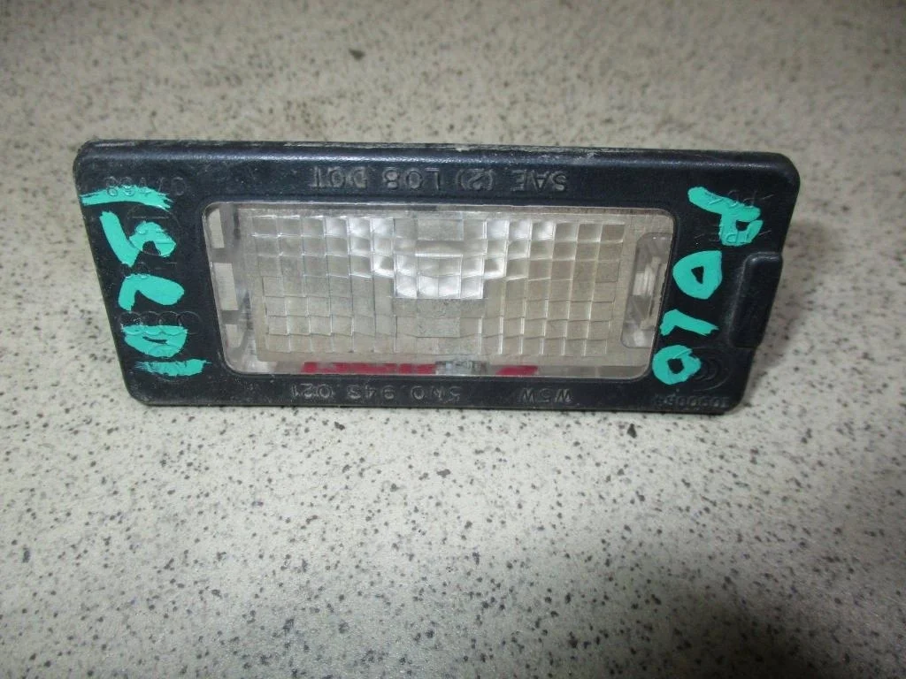 Фонарь подсветки номера Volkswagen Polo 5