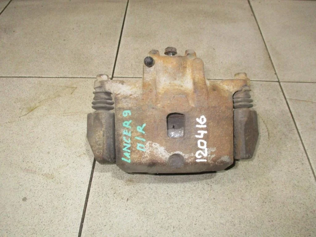 Суппорт передний правый Mitsubishi Lancer 9 CS