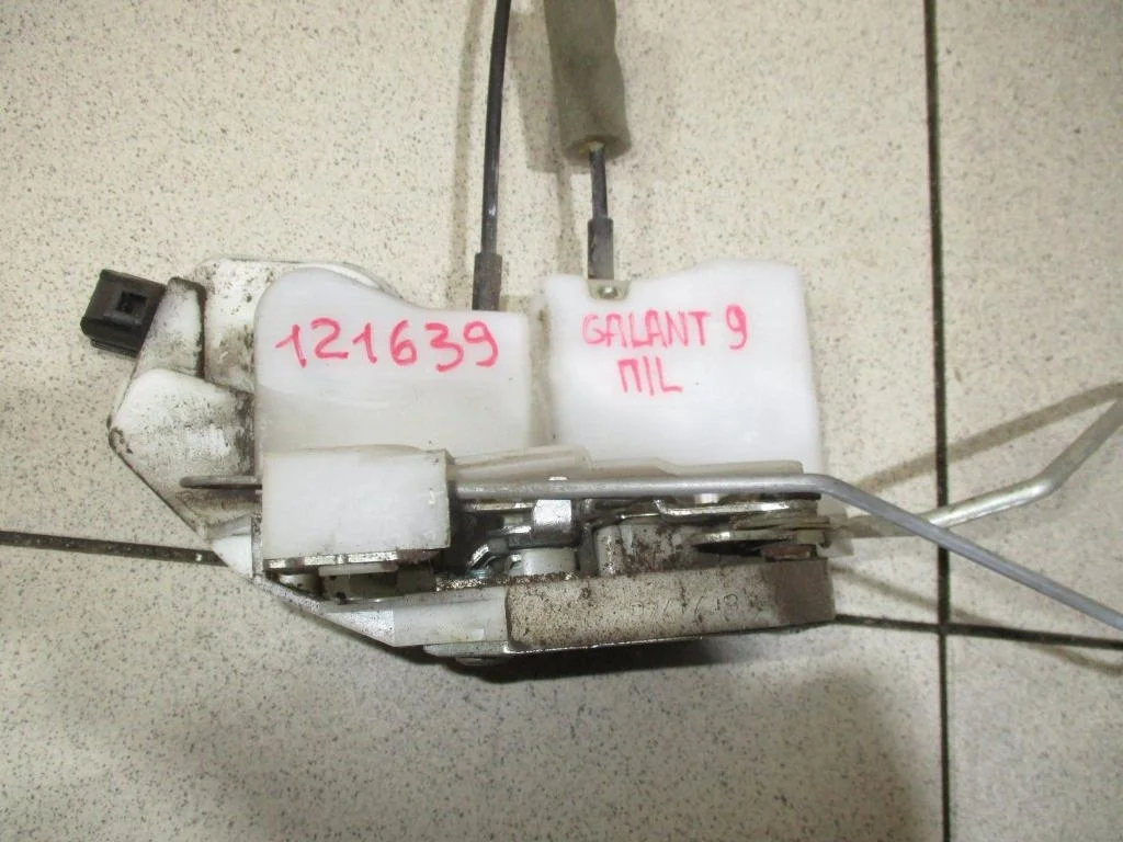 Замок двери передней левой Mitsubishi Galant 9 DJ, DM
