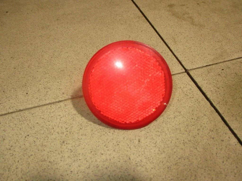 Отражатель в бампер задний левый Ford Fiesta 5