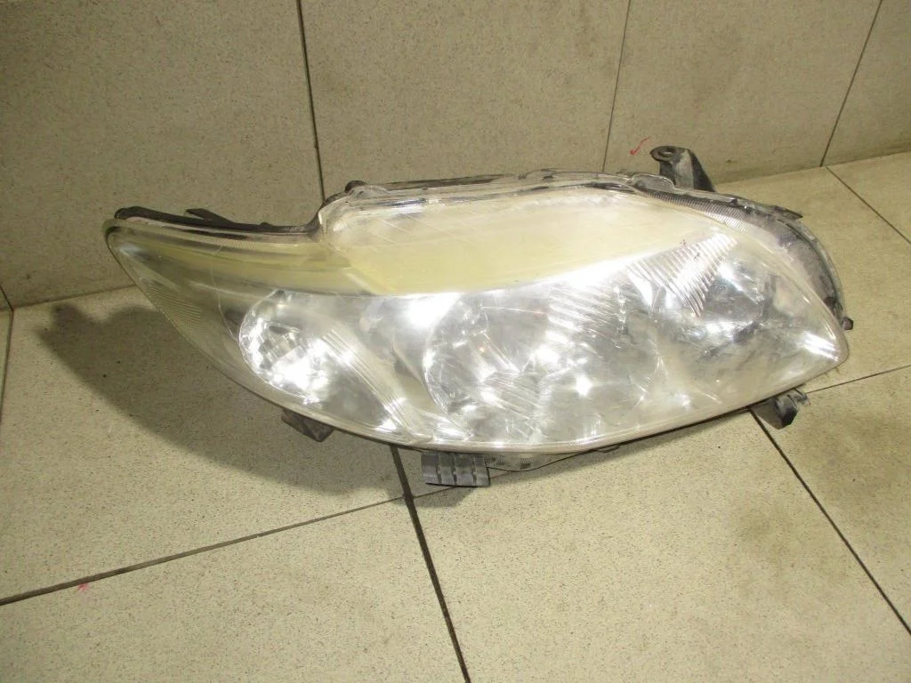 Фара правая Toyota Corolla E150