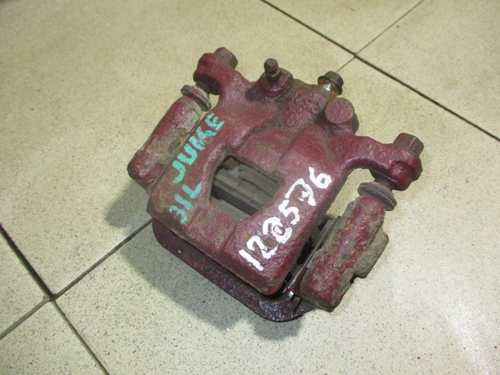 Суппорт задний левый Nissan Juke F15