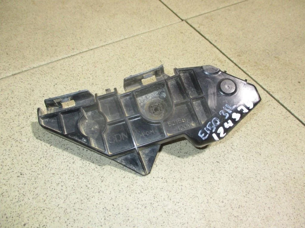 Кронштейн заднего бампера левый Toyota Corolla E150