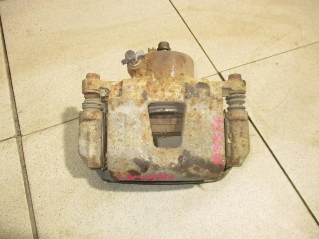 Суппорт передний правый Chevrolet Lacetti J200