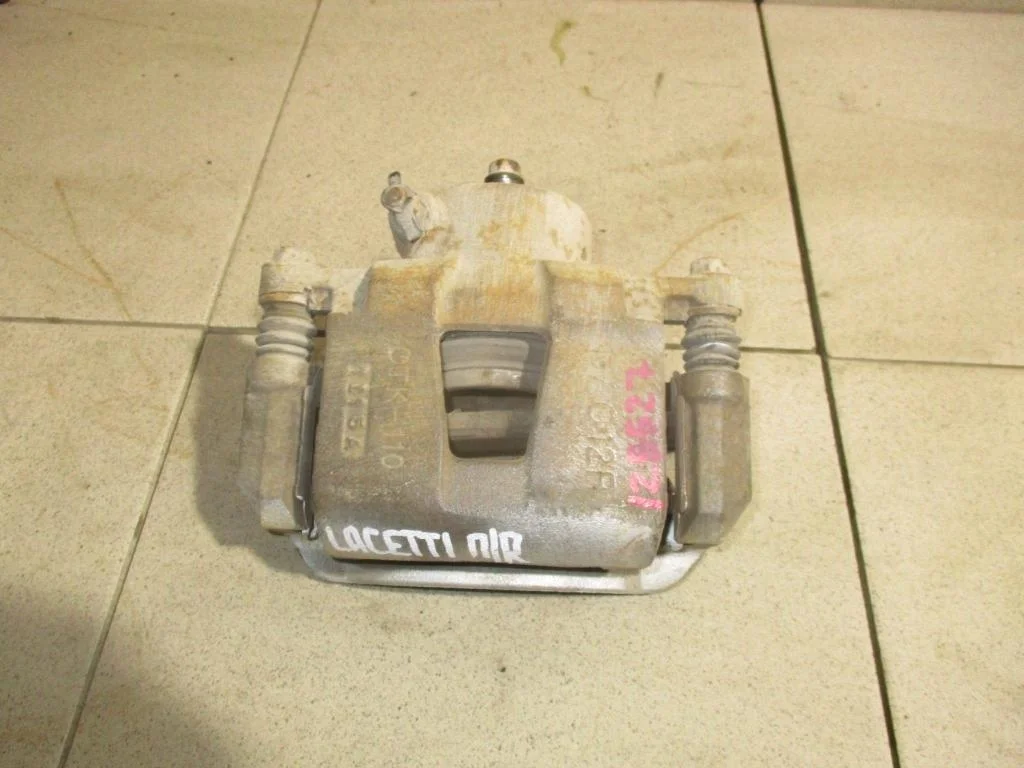 Суппорт передний правый Chevrolet Lacetti J200