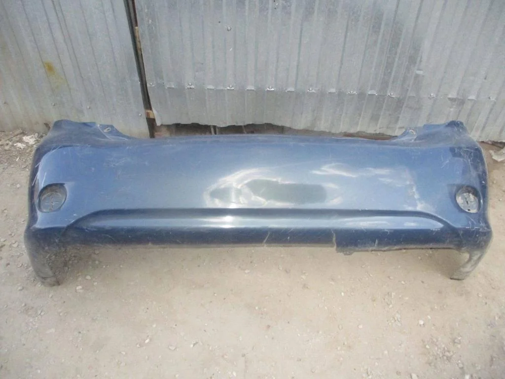 Бампер задний Toyota Corolla E150
