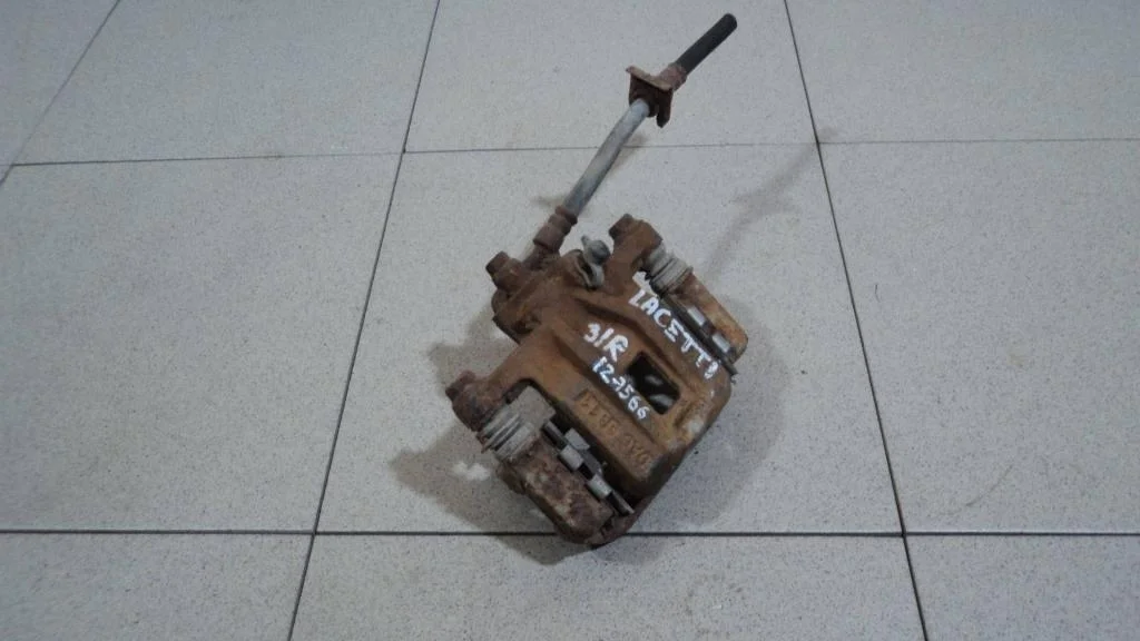 Суппорт задний правый Chevrolet Lacetti J200