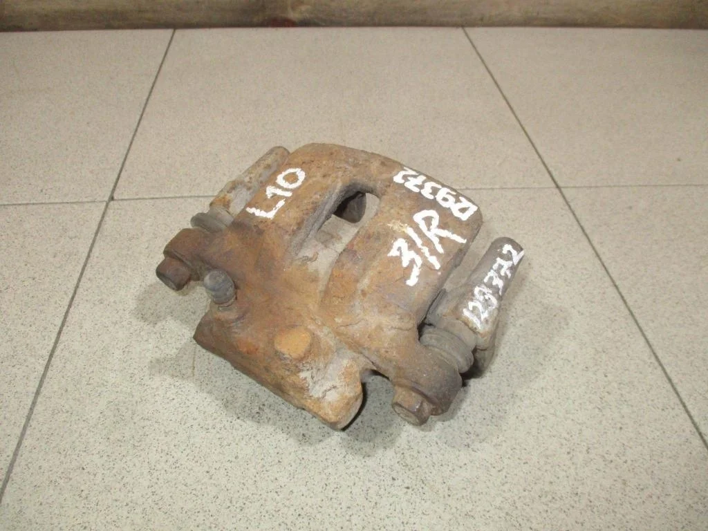 Суппорт задний правый Mitsubishi Lancer 10 CY