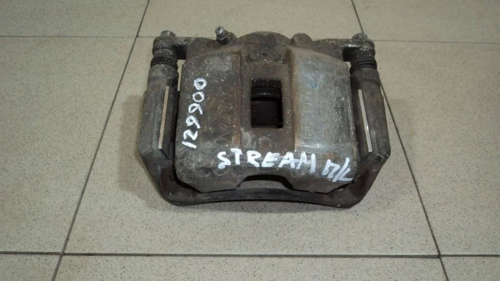 Суппорт передний правый Honda Civic 4D FD