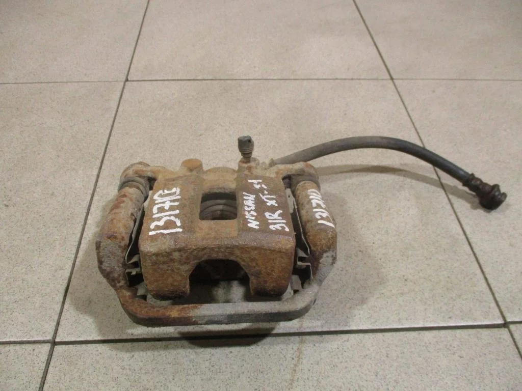 Суппорт задний правый Nissan X-Trail T31