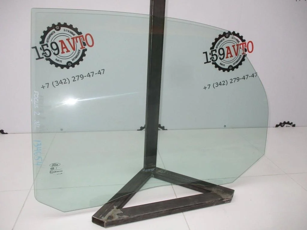 Стекло двери задней левой Ford Focus 2