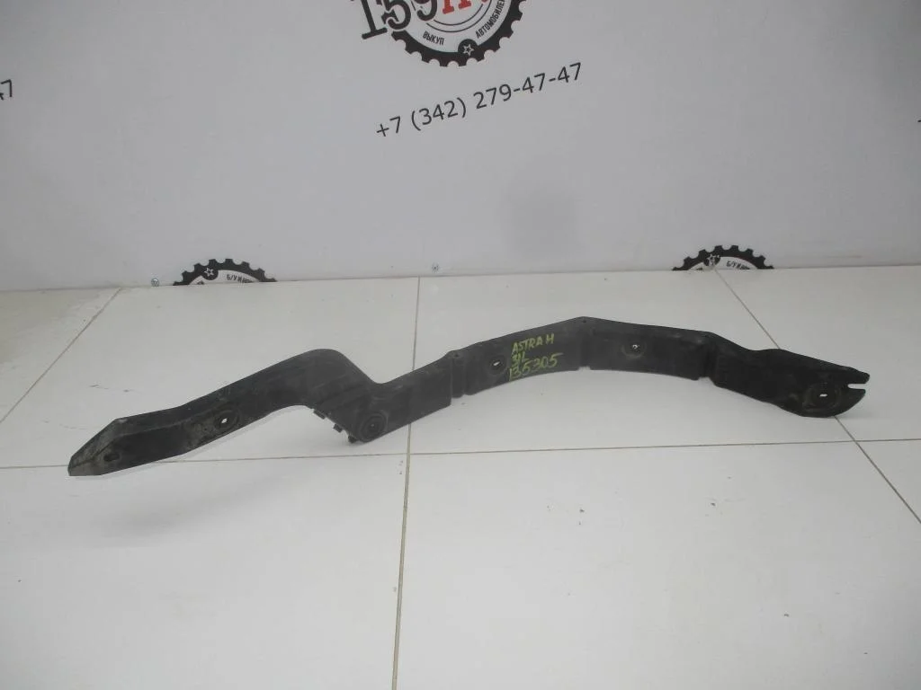 Кронштейн заднего бампера левый Opel Astra H