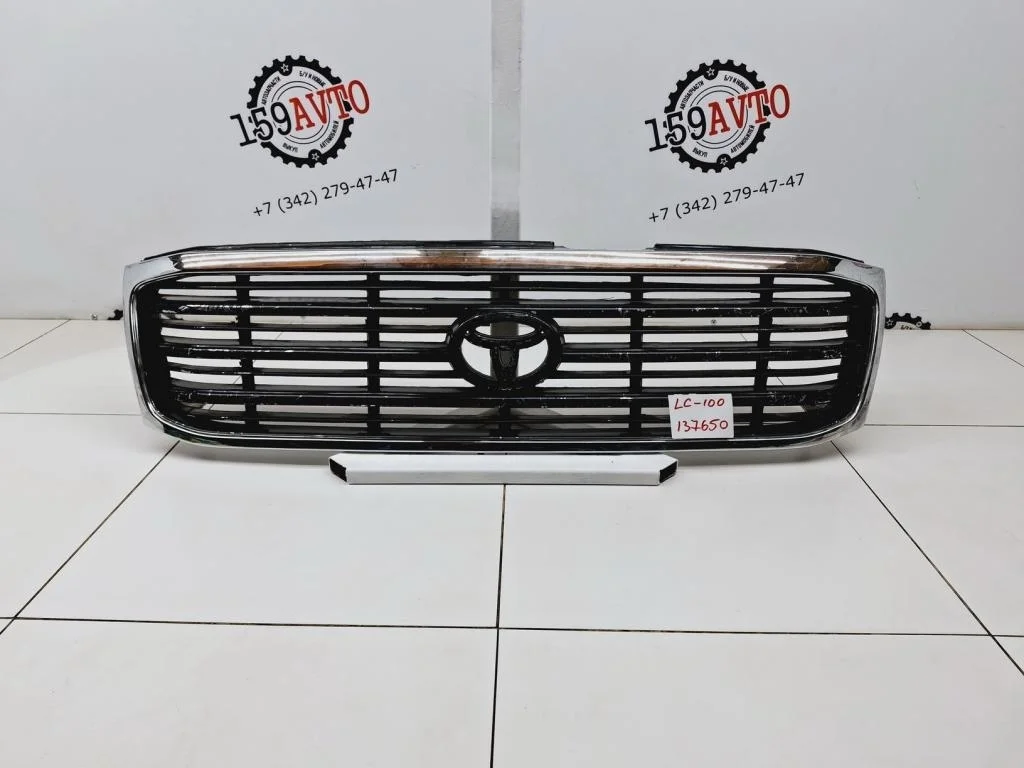 Решетка радиатора Toyota Land Cruiser J100