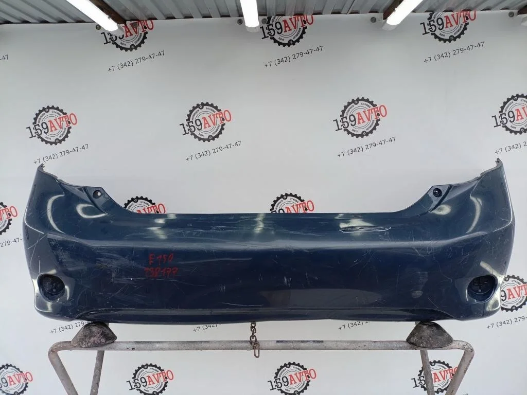 Бампер задний Toyota Corolla E150