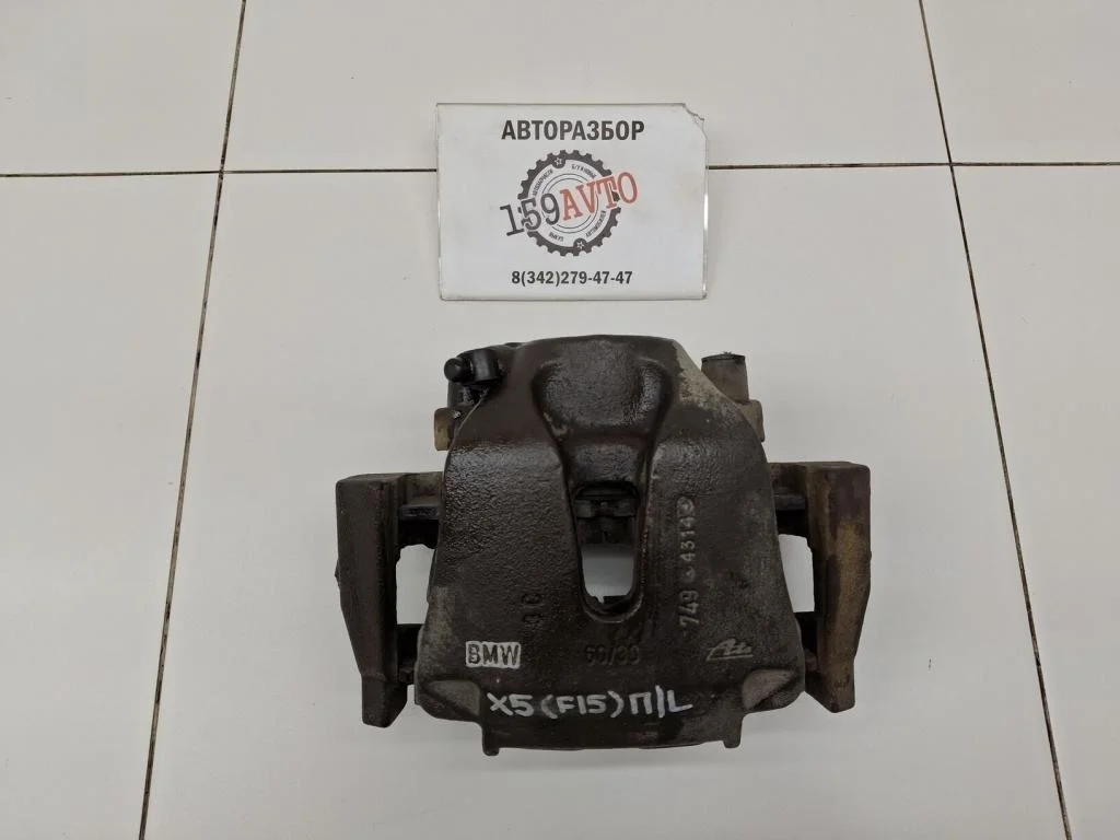 Суппорт передний левый BMW X5 2014 F15