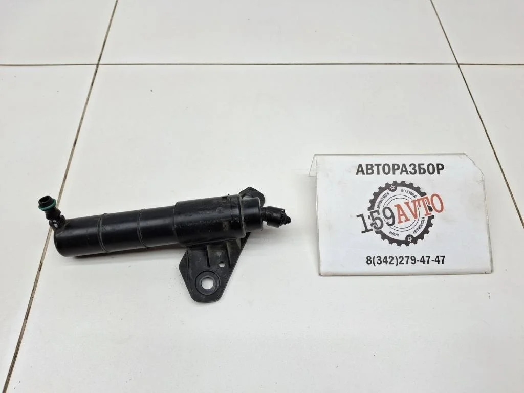 Форсунка омывателя фары Kia Sportage 3 SL