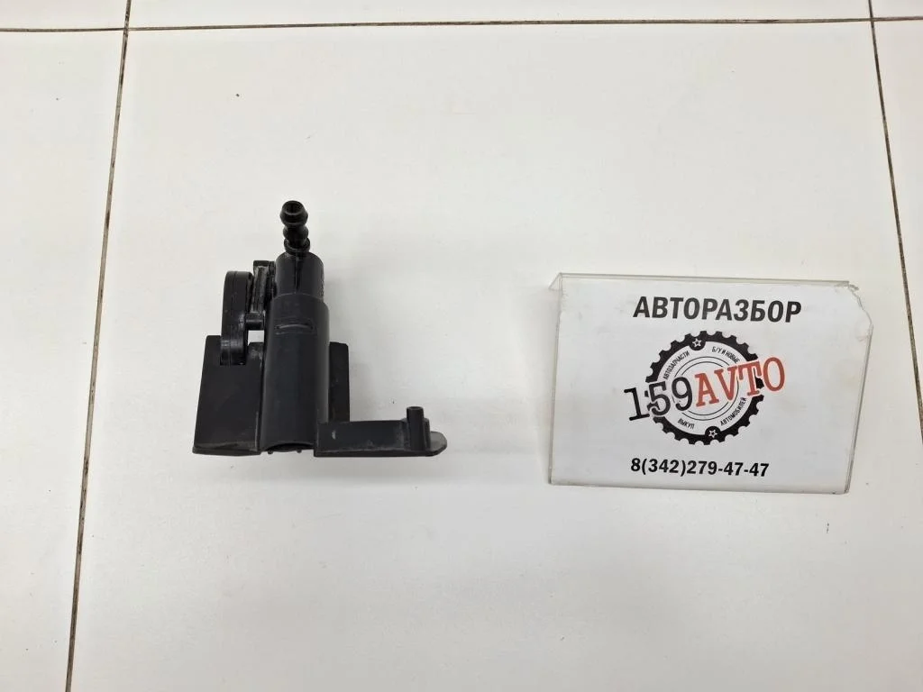 Форсунка омывателя фары Toyota Corolla E150