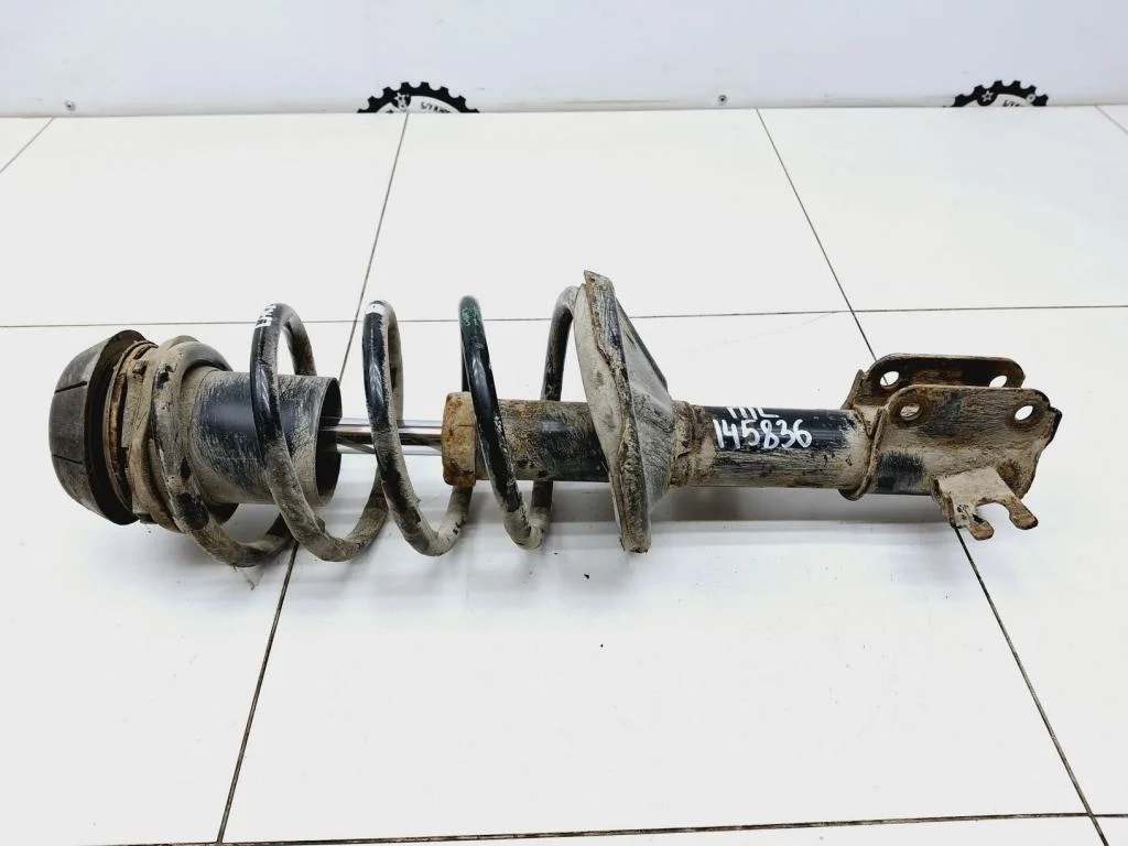 Амортизатор передний левый Chevrolet Lacetti 2012 J200