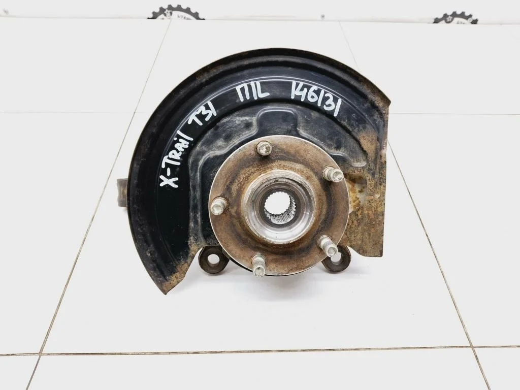 Кулак поворотный передний левый Nissan X-Trail 2011 T31