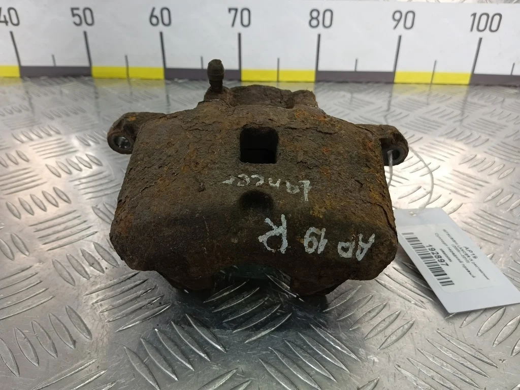 Суппорт передний правый MITSUBISHI LANCER IX рест