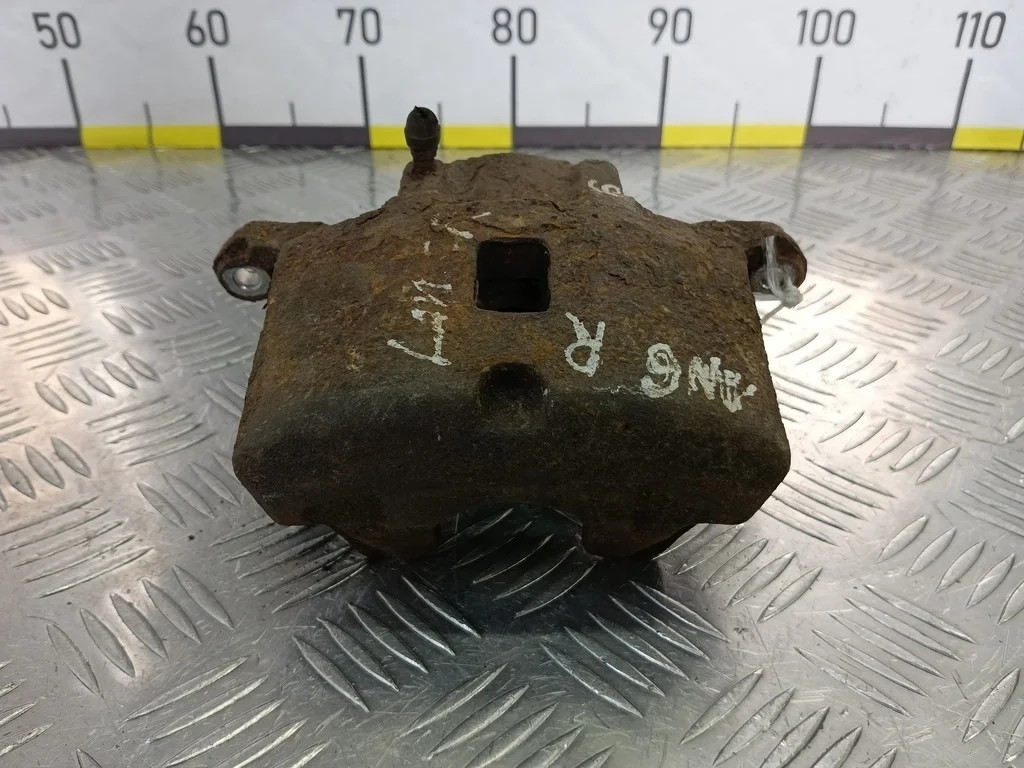 Суппорт передний правый MITSUBISHI LANCER IX рест