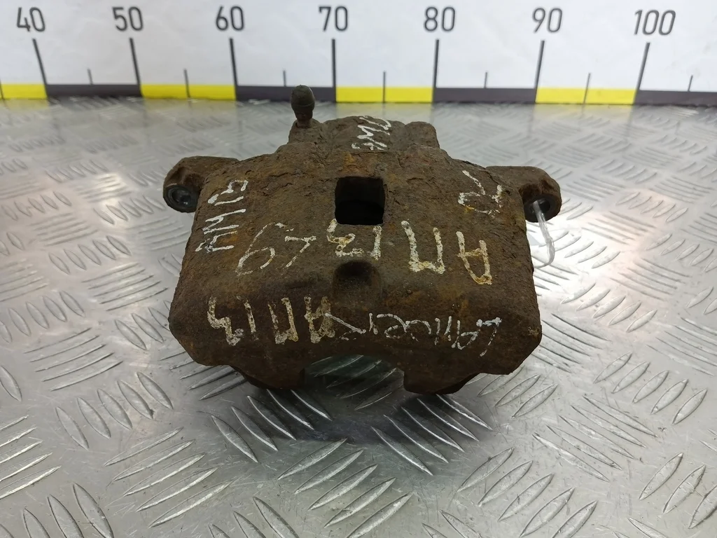 Суппорт передний правый MITSUBISHI LANCER IX рест