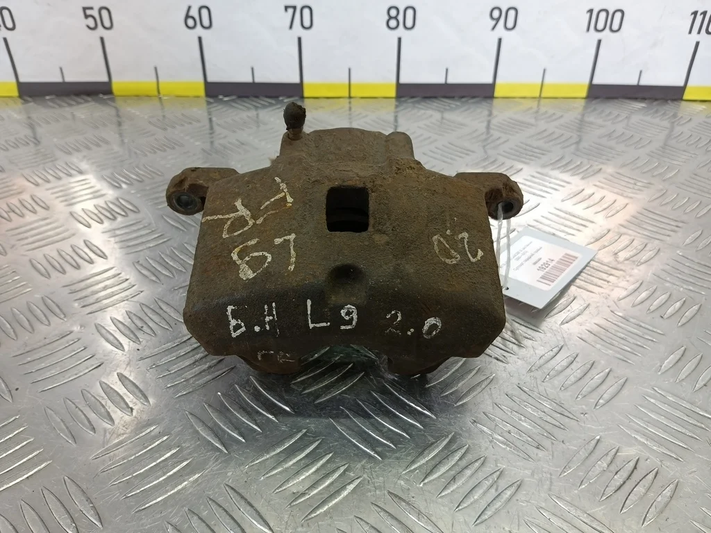 Суппорт передний правый MITSUBISHI LANCER IX рест