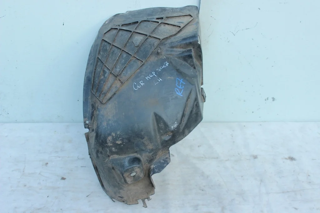 Передняя часть левого подкрылка Opel Corsa D