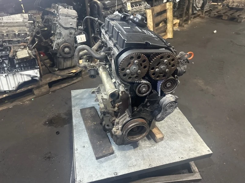 Двигатель Volkswagen Passat 2006-2011 03G100032D B6 BMR