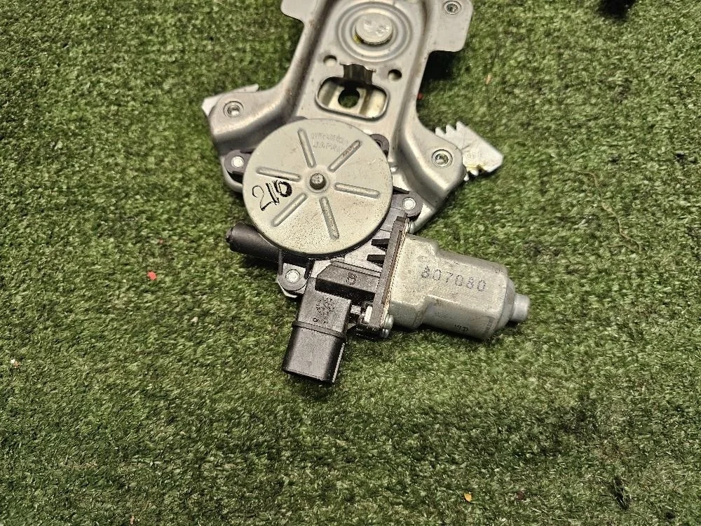 Моторчик стеклоподъемника лев Mitsubishi Lancer 10