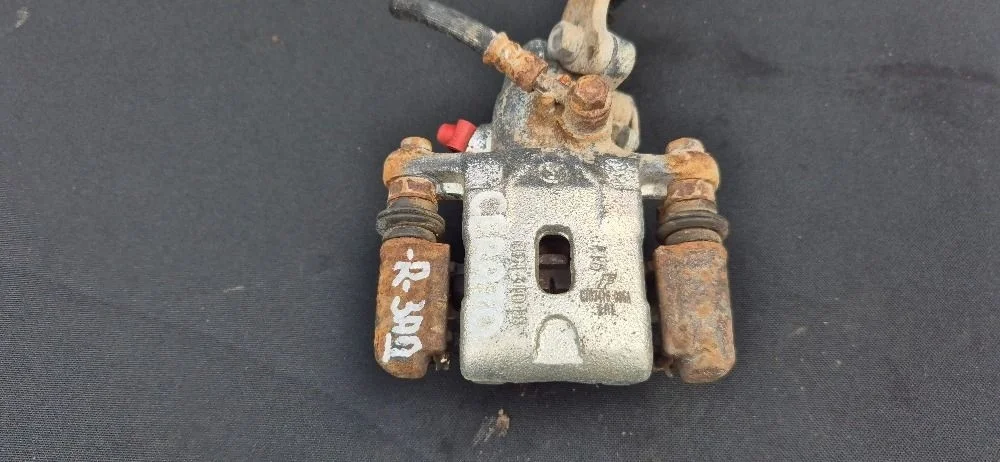 Суппорт тормозной задний правый для Kia Cerato 1