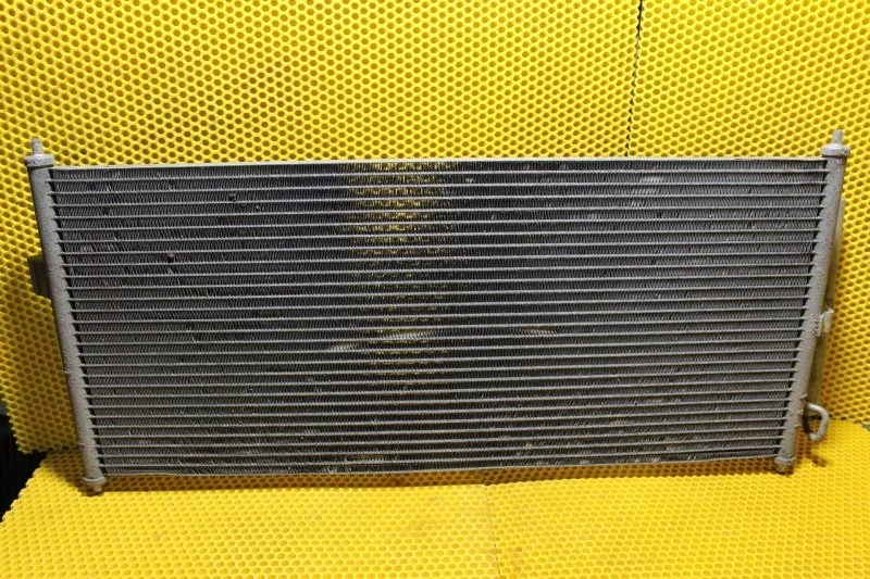 Радиатор кондиционера Nissan Primera 2001—2008 92100BM407 P12