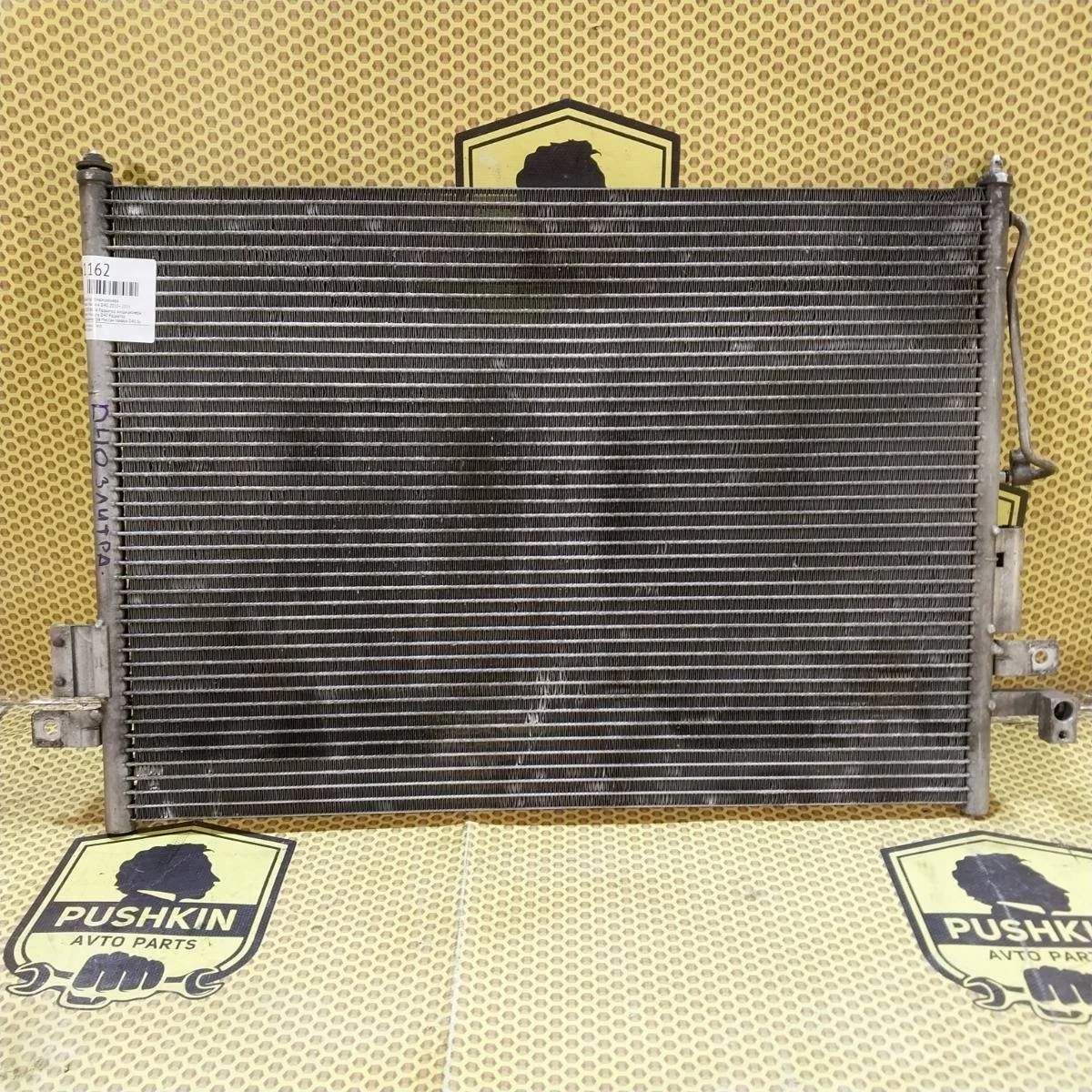 Радиатор кондиционера Nissan Navara 2010—2015 92100EB00A D40