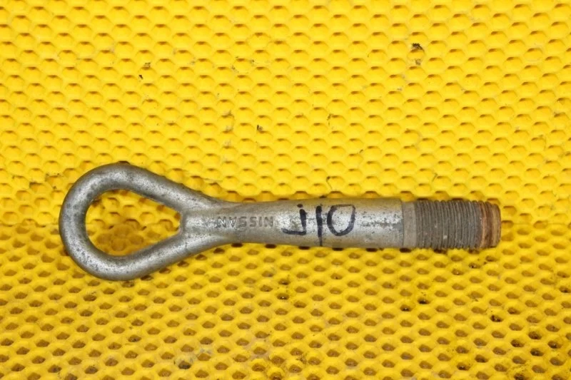 Крюк буксировочный Nissan Qashqai 51112JD00A J10