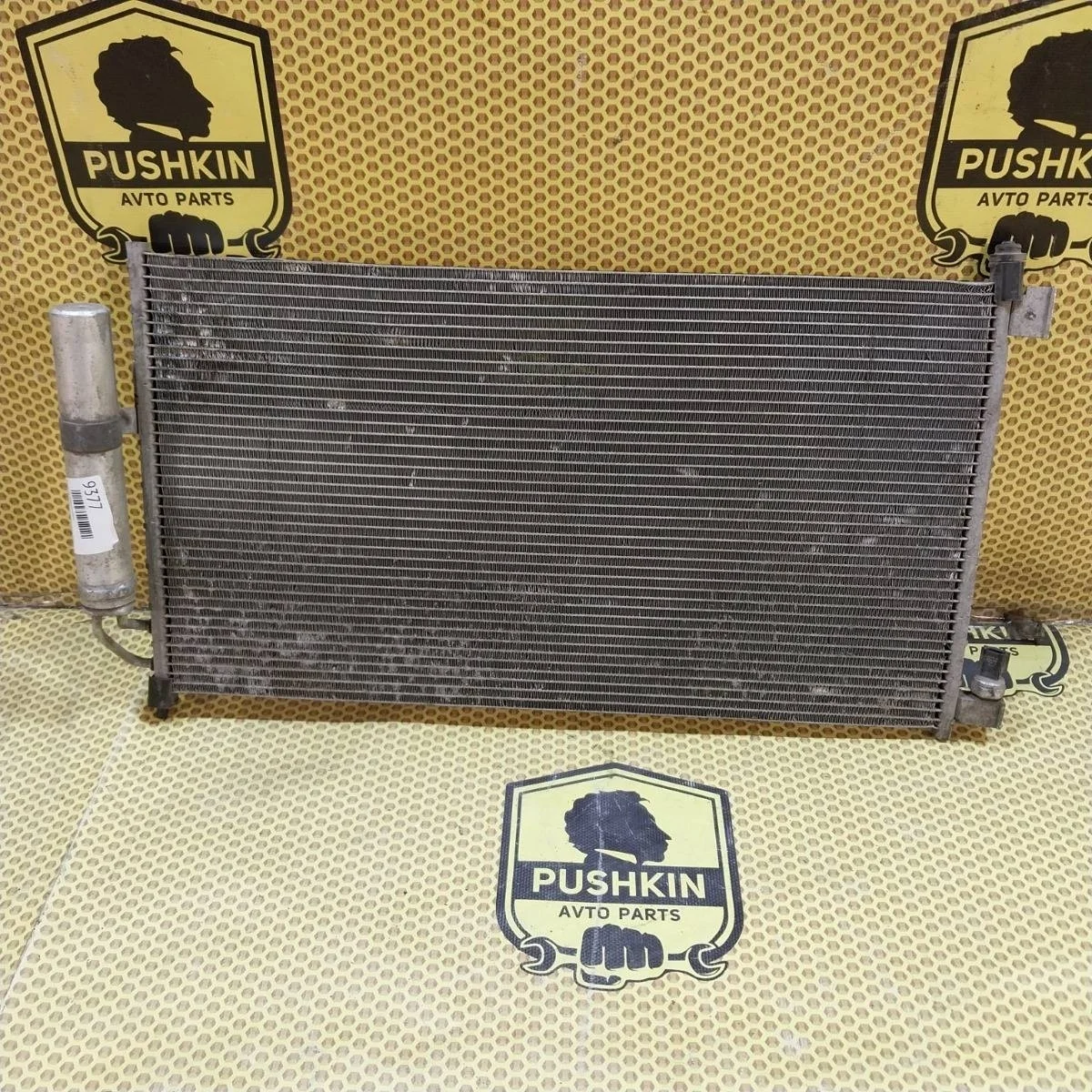 Радиатор кондиционера Nissan Tiida 92100ZW40D C11